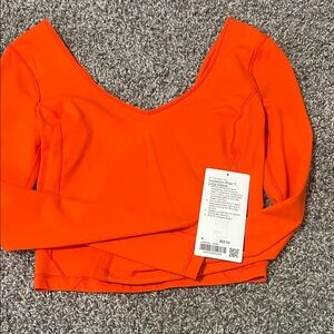 Lululemon Athletica Bright Orange Crop Top